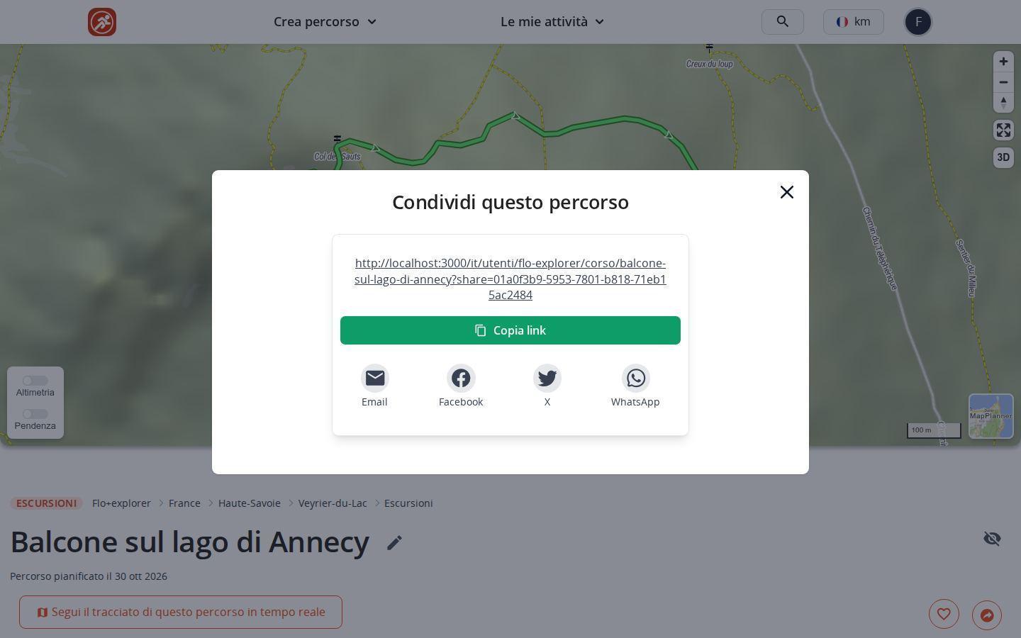 Finestra di condivisione di un percorso in MapPlanner su computer: link univoco, pulsante di copia e icone Email, Facebook, X e WhatsApp